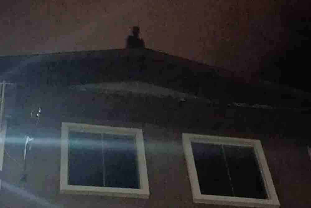 The man had been on the roof of the flat for two days.