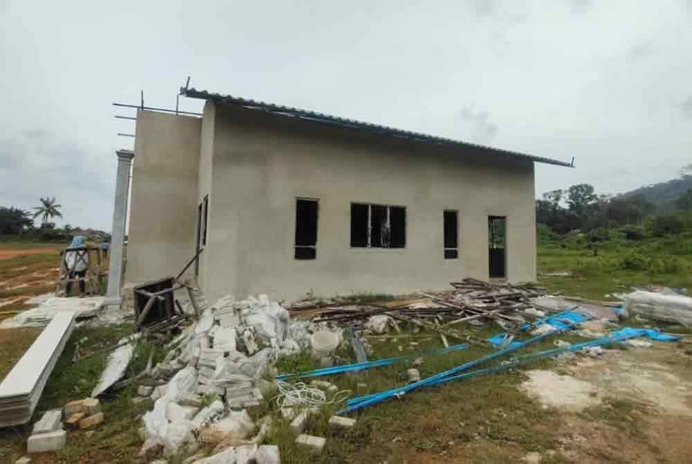 Among the victims' houses that were built halfway.