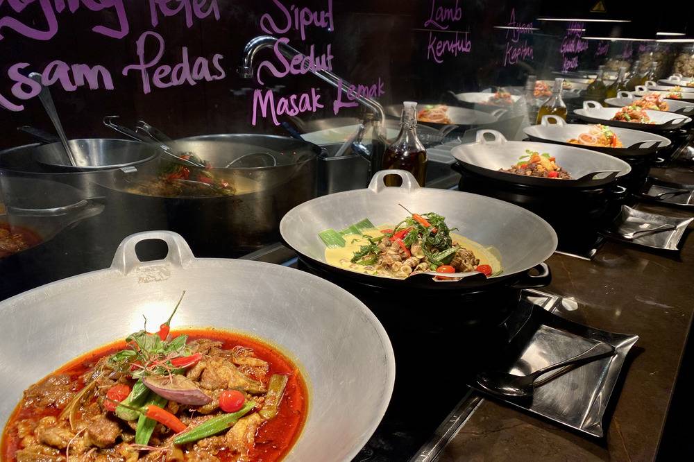 'Siput Sedut Masak Lemak' and 'Daging Tetel Asam Pedas'.