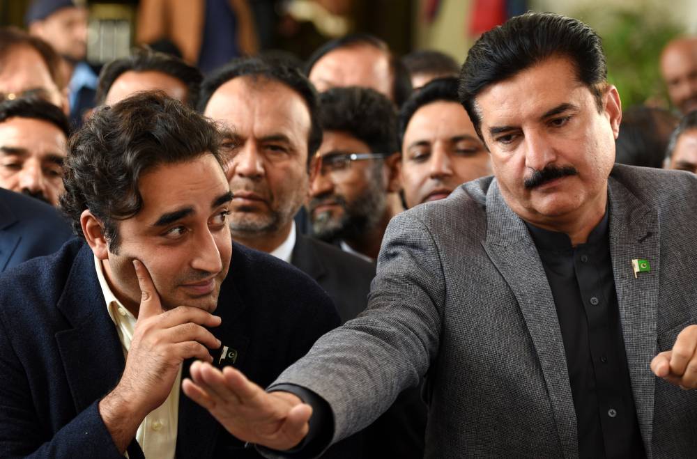 Bilawal Bhutto Zardari (L), chairman of Pakistan People's Party, speaks to journalists after a supreme court hearing related to a 12-year-old presidential reference on revisiting the death of his grand father who was also prime minister of Pakitsan, Zulfikar Ali Bhutto, in Islamabad, Pakistan, Feb 20, 2024. (EPA/SOHAIL SHAHZAD)