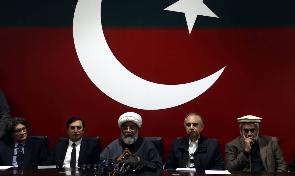 Rauf Hassan (L), central information secretary Pakistan Tehrik-e-Insaf (PTI), PTI party Chairman Barrister Gohar Ali Khan (2-L), Allama Raja Nasir Abbas, Chairman of Majlis Wahdat-e-Muslimeen (MWM) (C), Omar Ayub Khan (2-R), Pakistan Tehreek-e-Insaf (PTI) general secretary and the party's nominee for prime minister, and Sahibzada Hamid Raza, head of Sunni Ittehad Council (SIC), during a press conference as PTI announce alliance with SIT in Islamabad, Pakistan, Feb 19, 2024. (Photo by EPA/SOHAIL SHAHZAD)