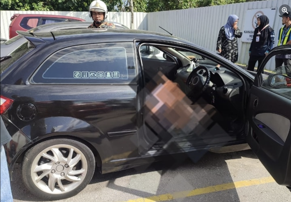 A man and a woman were found lifeless in a locked car at a petrol station near Muadzam Shah in Rompin yesterday. - Photo: FACEBOOK