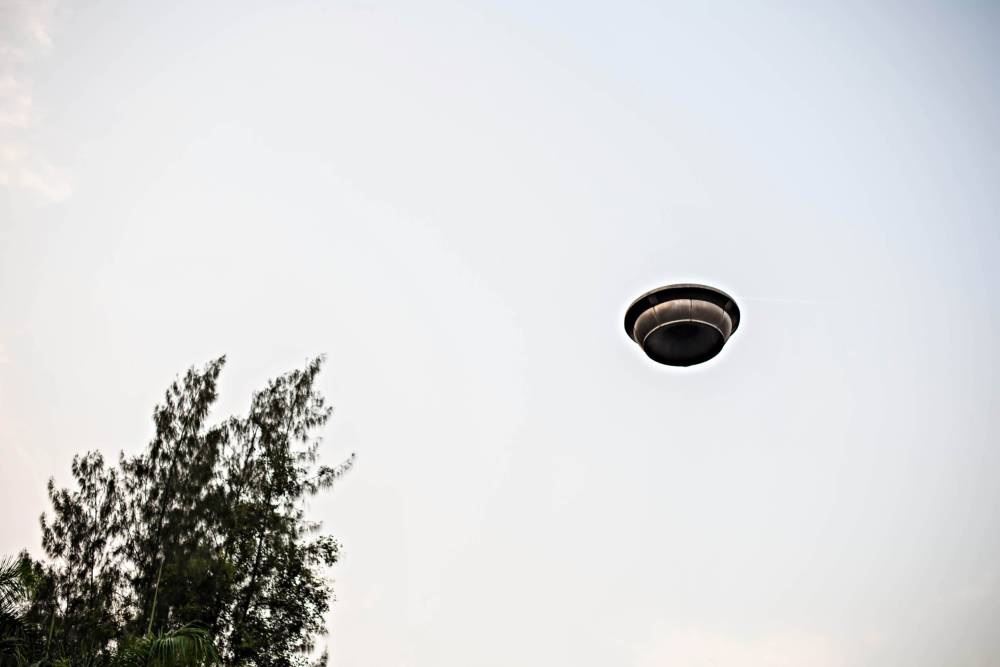 The Ukrainian military has caught on camera an alleged disc-shaped, completely silent unidentified flying object (UFO) hovering over the zone of the Ukraine conflict this month. Photo for illustrative purposes only - 123RF