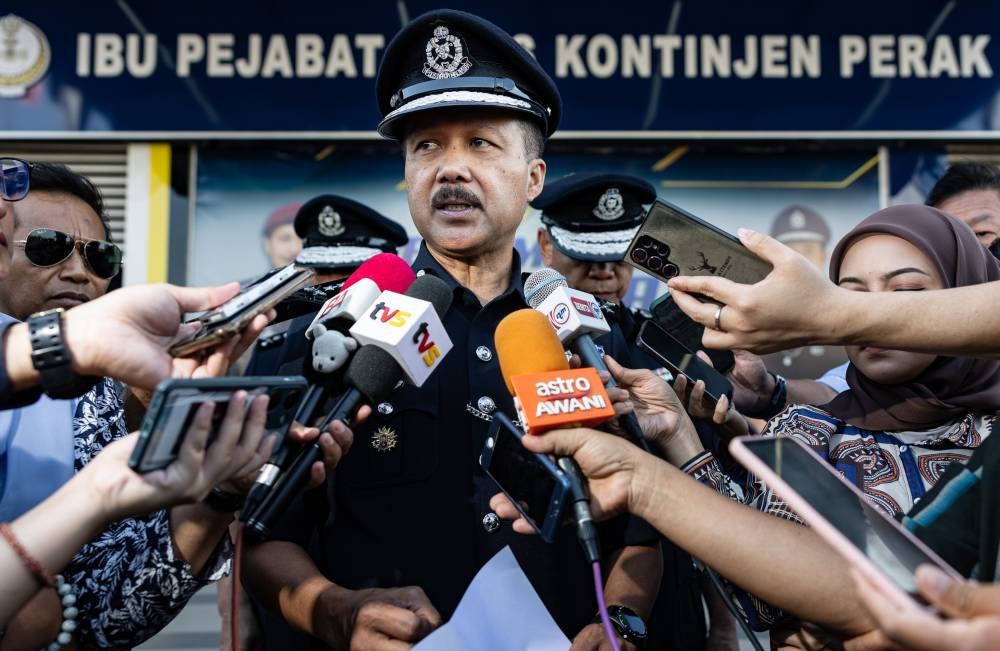 Perak police chief Datuk Seri Mohd Yusri Hassan Basri speaking to reporters after attending the Perak Police Chief's Monthly Meeting, today. - Photo by Bernama