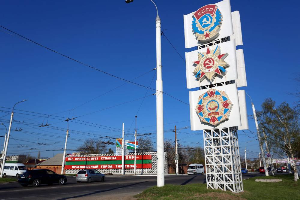 Soviet orders are displayed on a large billboard along the main thoroughfare entering Tiraspol, capital of the self-proclaimed Moldovan Republic of Transnistria. Photo by Oleksii Filippov/AFP