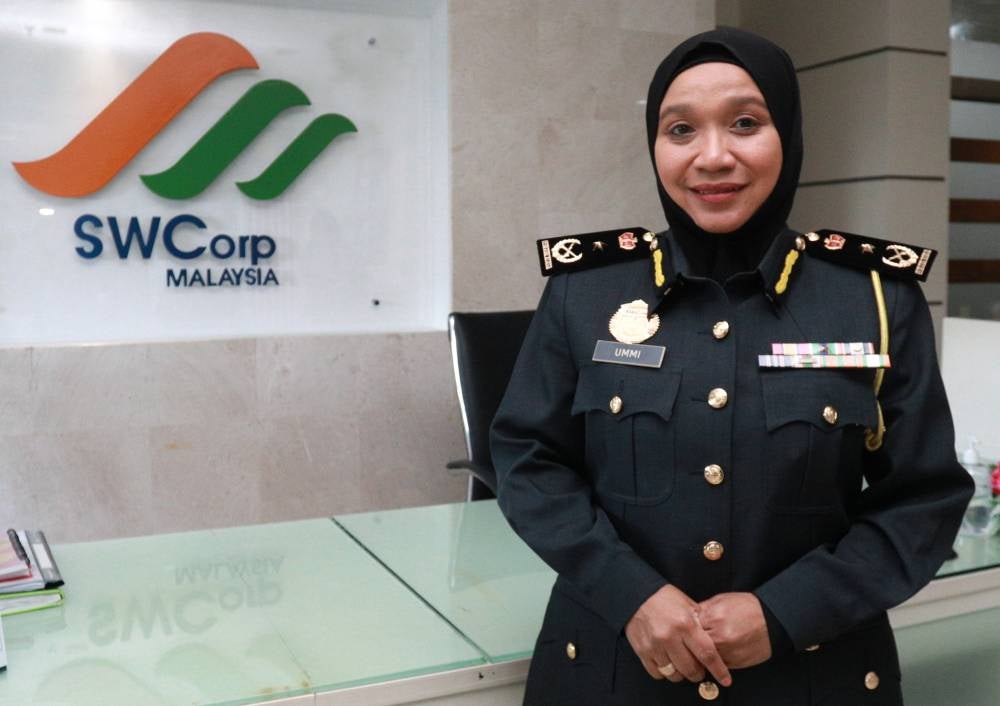 Sharing her experience, Ummi Kalthum said among the key challenges faced by the Federal Territory SWCorp enforcement team include trash hoarders. - Photo by Bernama