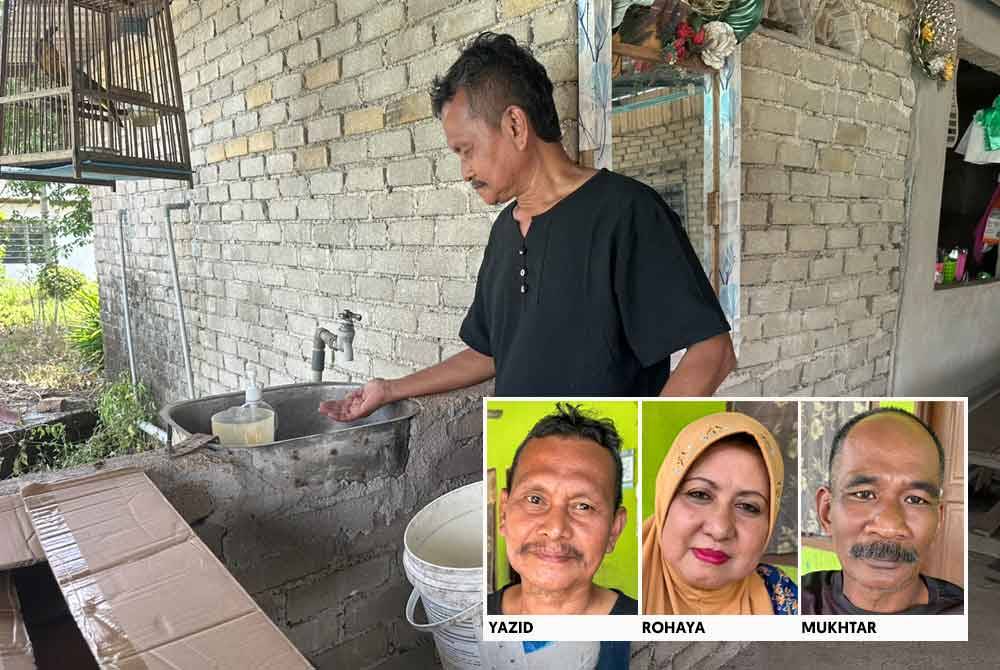 Yazid showing the tap that had no water.