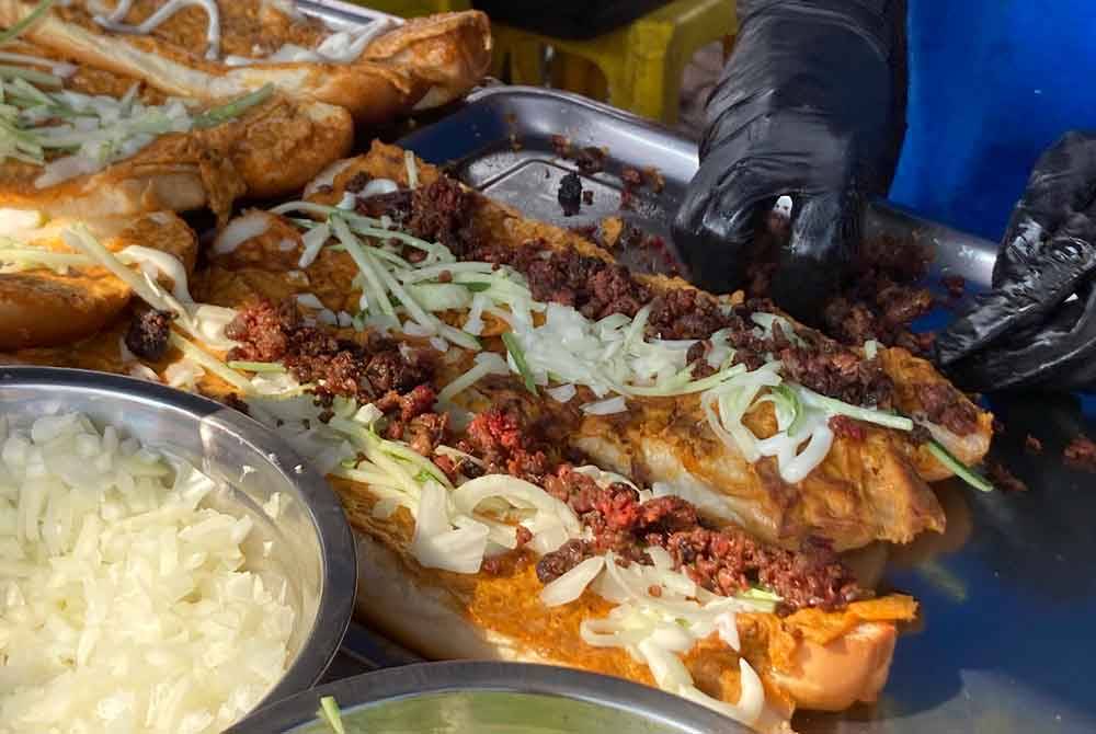 Chicken and beef roti john are sold at RM10 at the Ramadan bazaar in Section 13, Shah Alam.