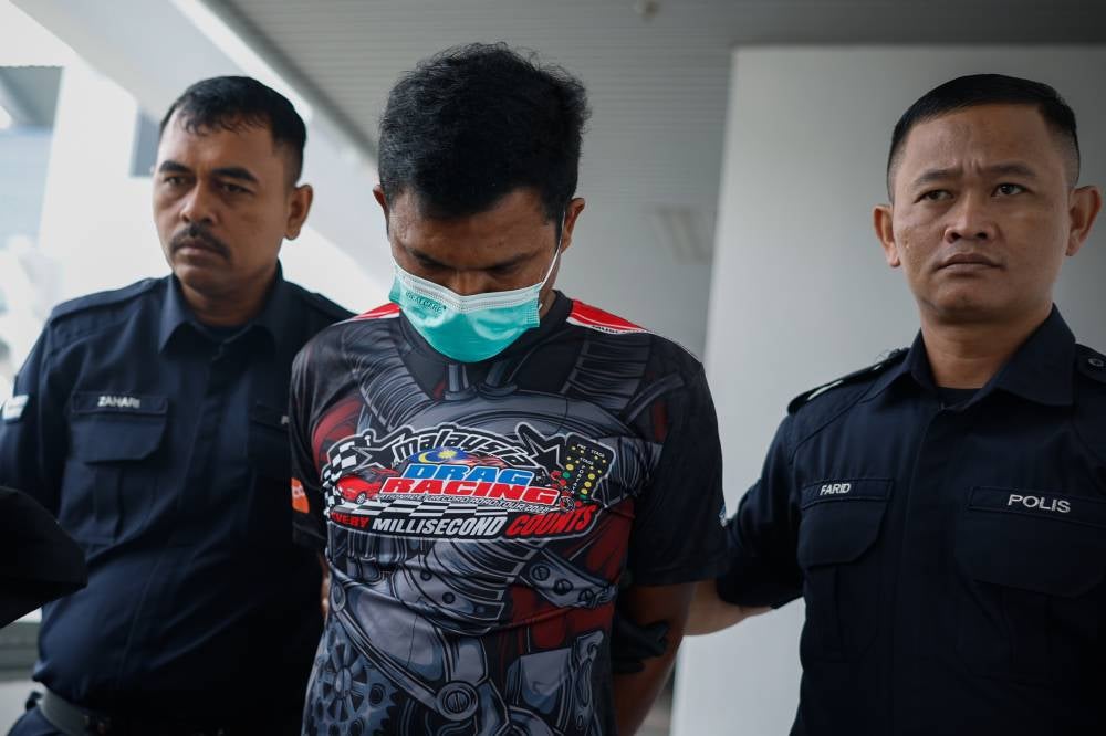 A former soldier with the rank of corporal Mohd Amanah Habhijullah, 36, pleaded not guilty in the Ayer Keroh Magistrate's Court here today to 15 charges of using criminal force to molest a male soldier and two charges of causing injury to the same victim. - Photo by Bernama