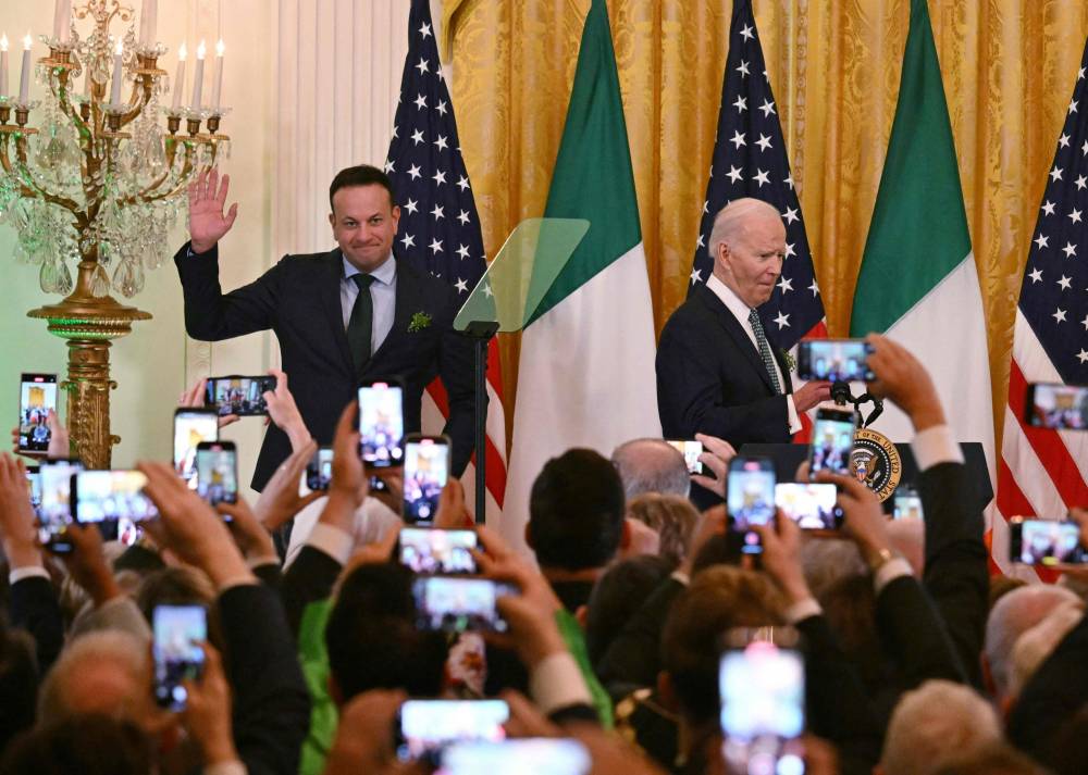 Taoiseach of Ireland Leo Varadkar (L) and US President Joe Biden depart after speaking at a St. Patrick’s Day Celebration in the East Room of the White House in Washington, DC, on March 17, 2024. (Photo by AFP)