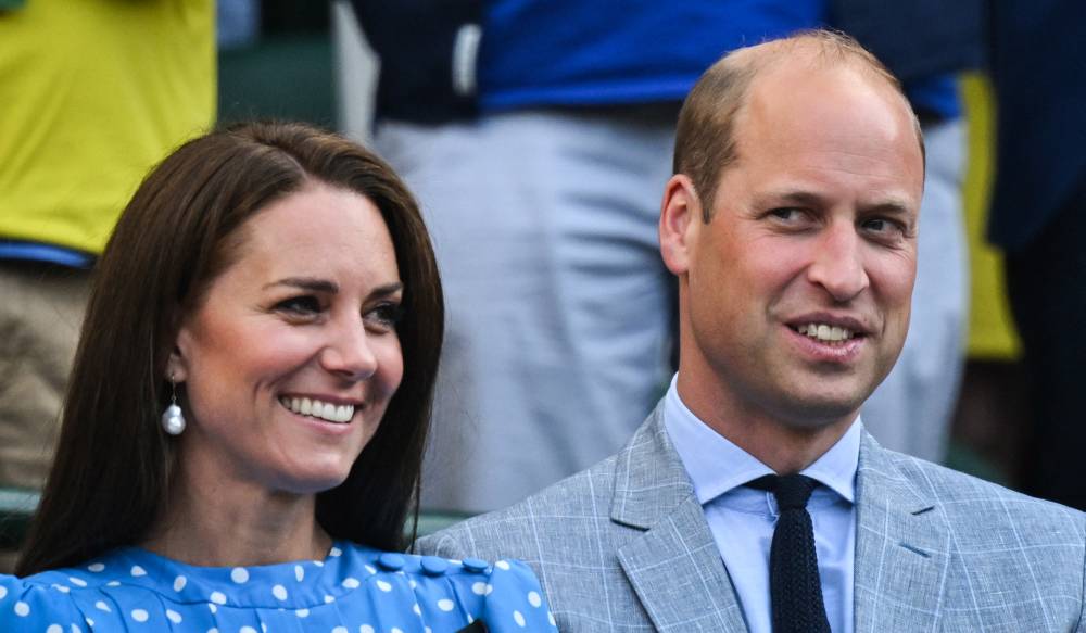 Britain's Catherine, Duchess of Cambridge and Britain's Prince William, Duke of Cambridge at the end of the men's singles quarter final tennis match between Belgium's David Goffin and Britain's Cameron Norrie on at Court 1 on the ninth day of the 2022 Wimbledon Championships at The All England Tennis Club in Wimbledon, southwest London, on July 5, 2022. - Photo by AFP