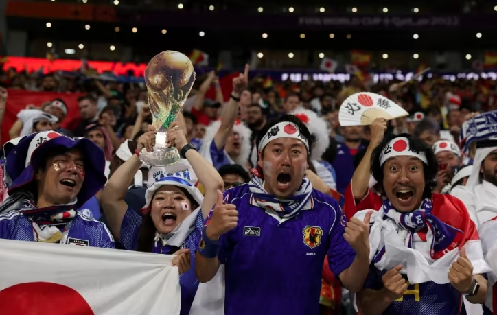 Japan supporters celebrate after their team won the Qatar 2022 World Cup Group E football match between Japan and Spain at the Khalifa International Stadium in Doha on Dec 1, 2022. (File photo by AFP)
