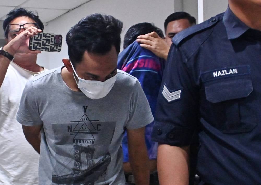 Teacher Mohd Hasfyanizam Mansor, 48, pleaded not guilty at the Kuala Terengganu Sessions Court, today to trafficking a local woman for sexual exploitation. - Photo by Bernama 