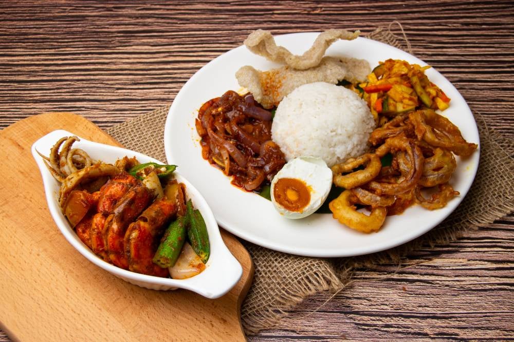 Rice Set Menu with Prawn Sambal as gravy of choice with a side of fried onion, salted egg, fried prawn, acar and fish crackers.