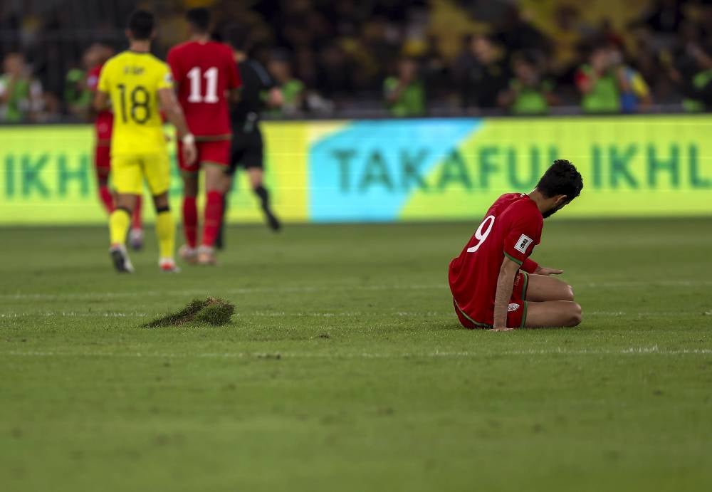 The poor condition allegedly resulted in injuries for Malaysia’s defender Azam Azmi and Oman striker Omar Al Malki (in pic). - Photo by Bernama