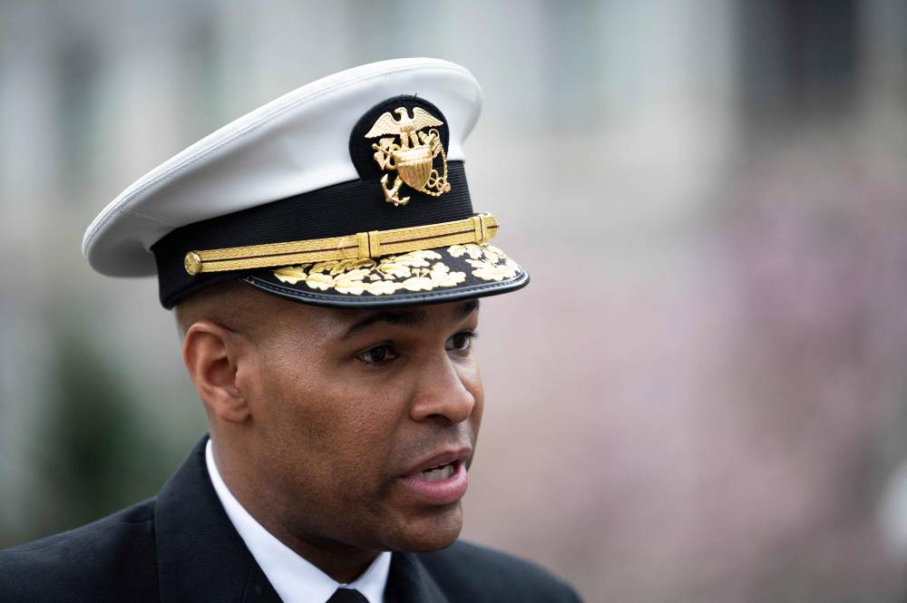 US Surgeon General Jerome Adams speaks outside the White House in Washington, DC, on March 20, 2020. FILE PIX by AFP