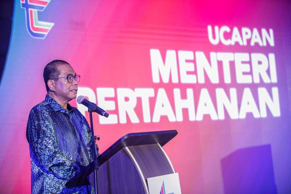 Defence Minister Datuk Seri Mohamed Khaled Nordin delivering his speech during the LTAT 2023 dividend announcement, today. - Photo by Bernama 
