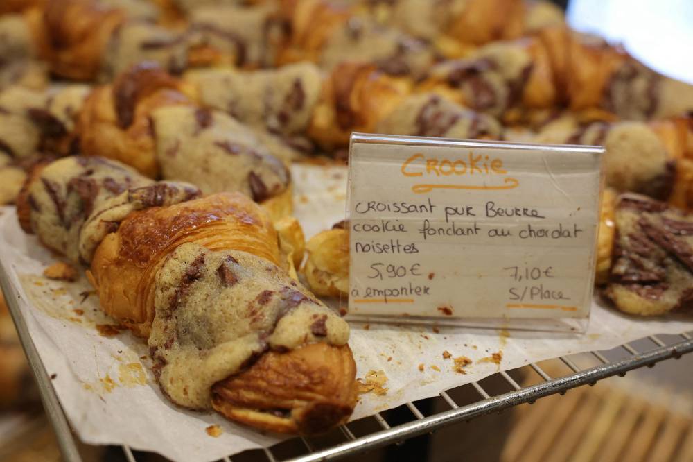 Crookies, a traditional French croissant mixed with a cookie dough, in the pastry shop of French pastry chef Stephane Louvard in Paris. Photo by Thomas Samson/AFP