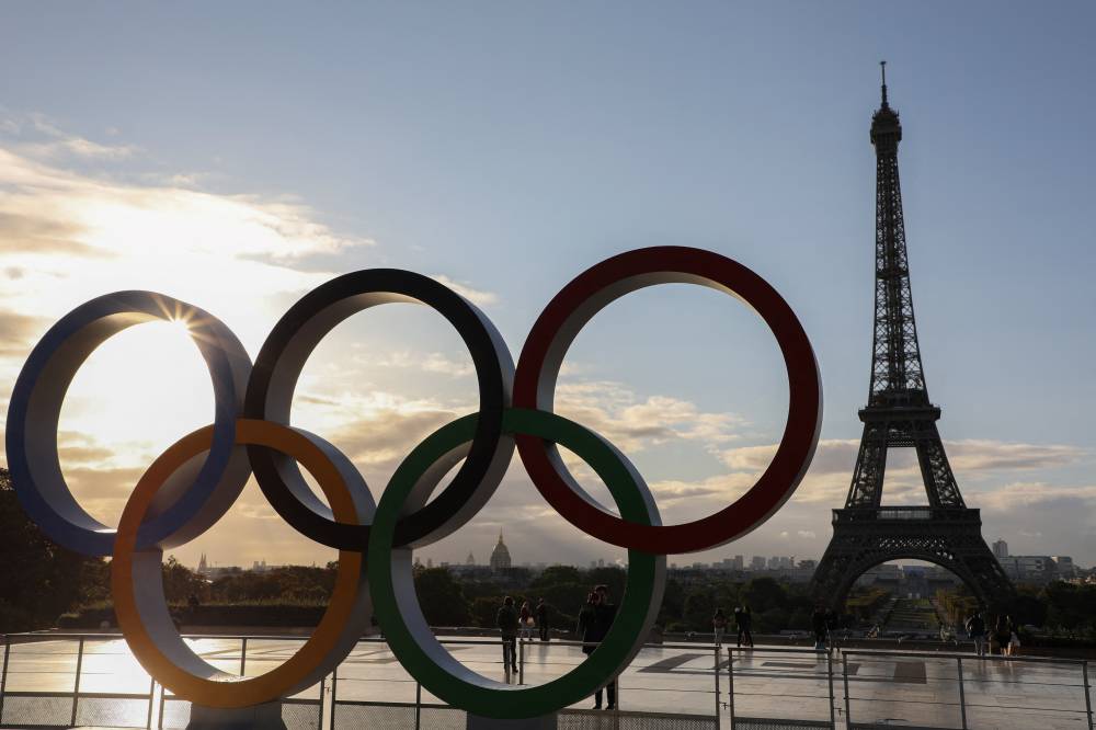 The Olympic rings will be installed on the Eiffel Tower for the Paris 2024 Olympic Games, it was learned from the site's operator on April 8, 2024. -(Photo by LUDOVIC MARIN / AFP)