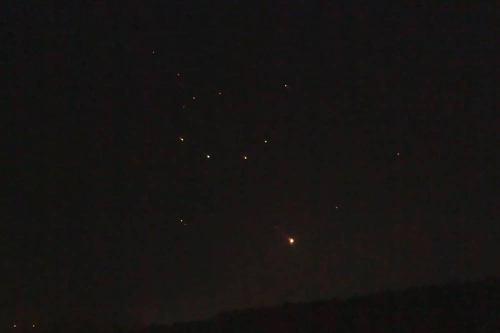 This video grab from AFPTV taken on April 14, 2024 shows Israeli air defence systems intercepting projectiles amid an Iranian attack on Israel. Photo by Saleh Hamad/AFP