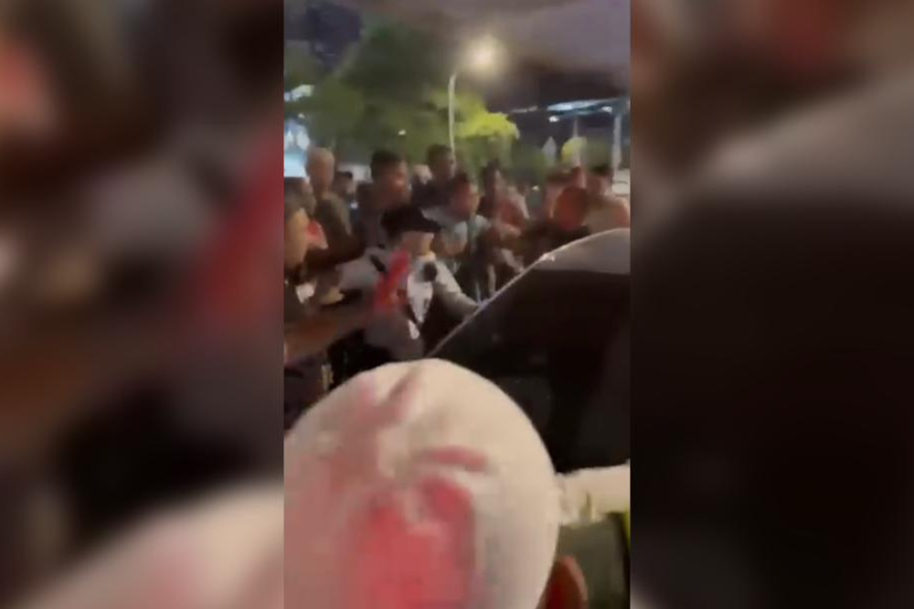 Videos of the incident circulated on Facevook, which showed an angry crowd surrounding a car with a male driver and a female passenger, with the car having a shattered window.