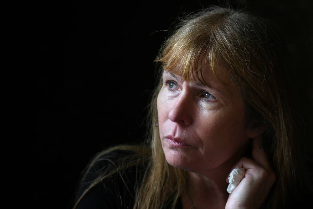 This picture taken on May 20, 2018 shows British journalist Clare Rewcastle Brown listening during an interview with Agence France-Presse (AFP) in Kuala Lumpur. - (Photo by MOHD RASFAN / AFP)