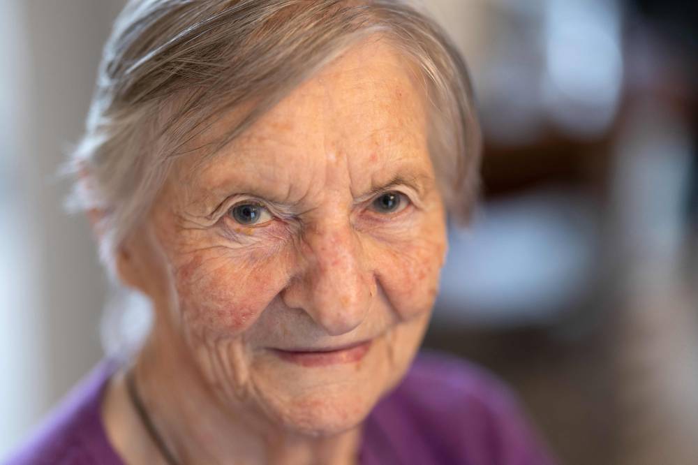 Jeanne Tournellec poses in Locmaria-Plouzane, north-western France on March 14, 2024, 80 years after her sister Catherine Tournellec was raped and her brother-in-law, Eugene Tournellec was killed on August 20, 1944 by US soldier William Mack. - Photo by AFP