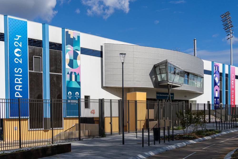 Photo taken on May 3, 2024 shows the exteriors of the Yves-du-Manoir Stadium in Colombes, northwest suburbs of Paris, France. The Yves-du-Manoir Stadium was the central stage for the 1924 Olympics, hosting the opening ceremony and various competitions, including athletics, football, gymnastics, and some equestrian events. For this year's Olympics, the stadium in Paris' northwest suburbs will host the field hockey events. (Photo by Xinhua/Xiao Yazhuo)