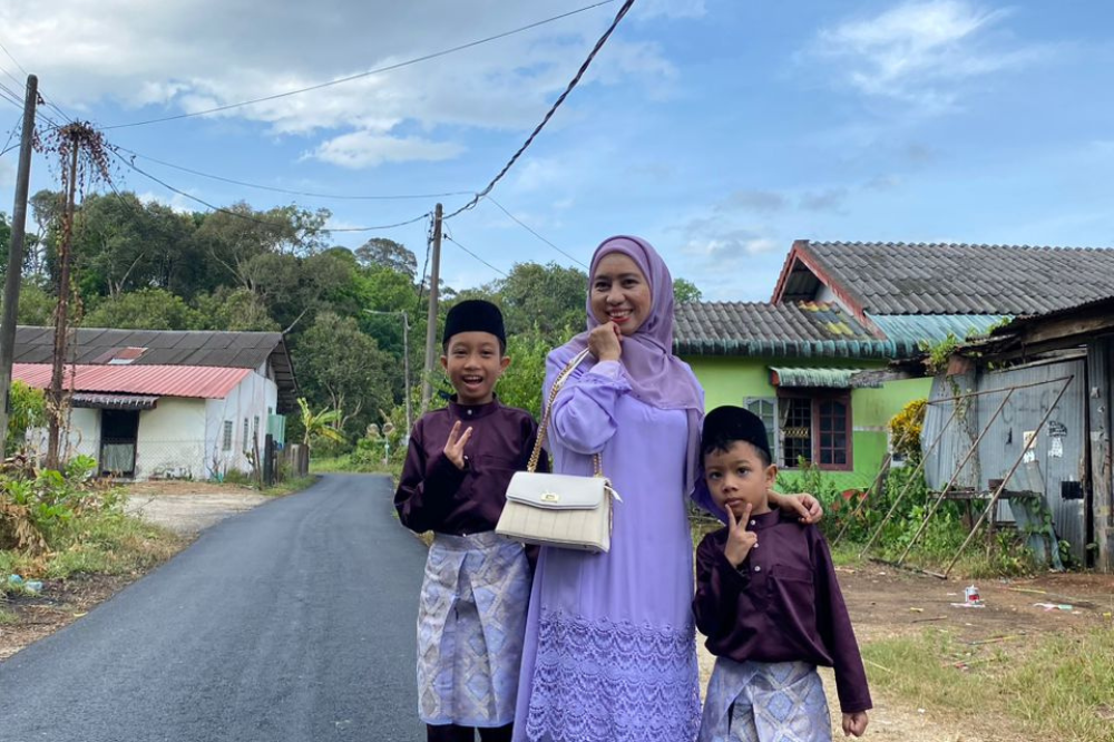 Suhaini Jusoh with her two sons.