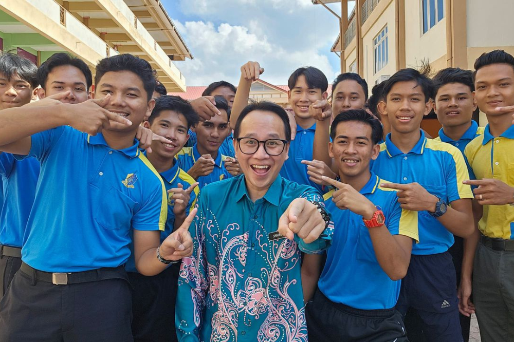 Sir Asai with his students.