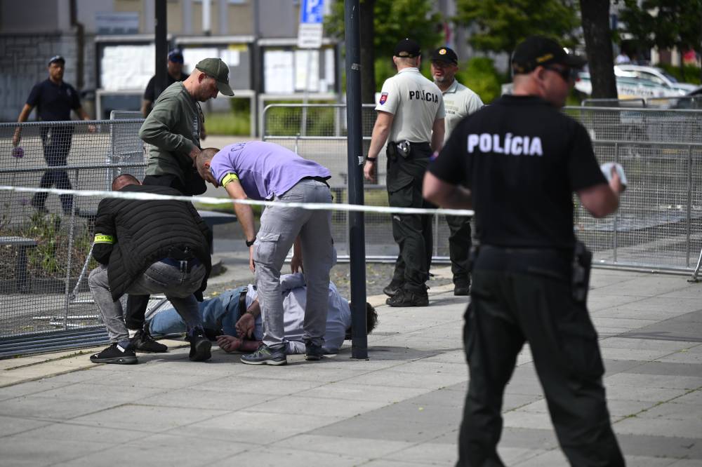 A man is detained on the site where Slovak Prime Minister Robert Fico was shot and wounded in Handlova, Slovakia. Photo by News Agency of the Slovak Republic/Xinhua.