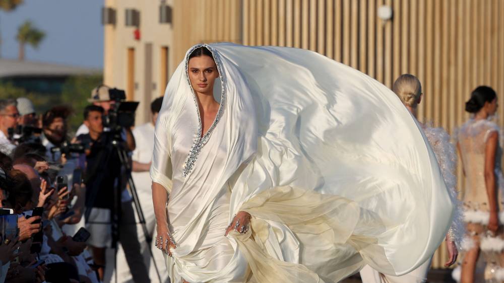 A model presents a creation of Saudi designer Tima Abid. Photo by Fayez Nureldine/AFP