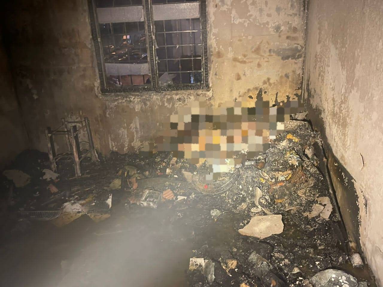 The victim was found on a bed in one of the rooms.