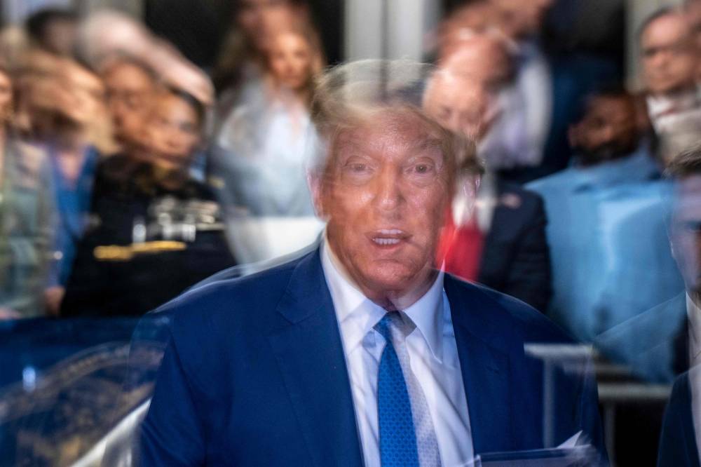 Former US President and Republican presidential candidate Donald Trump speaks to the press at the conclusion of the day's proceedings in his criminal trial at Manhattan Criminal Court in New York City on May 20, 2024. - Photo by AFP