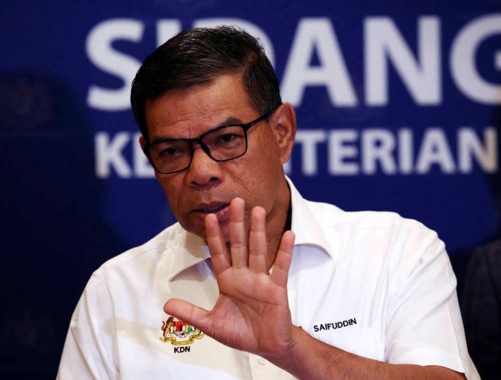 Home Minister Datuk Seri Saifuddin Nasution Ismail speaking at a press conference after the special committee meeting to tackle congestion at the Johor Causeway and visiting the Bangunan Sultan Iskandar Customs, Immigration and Quarantine Complex today. - Photo by Bernama