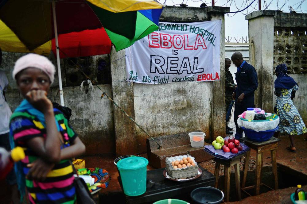 A sign warning of the dangers of ebola outside a government hospital in Freetown on August 13, 2014. May 24, 2024 marks 10 years since the first Ebola cases were reported in Sierra Leone. - File photo by AFP