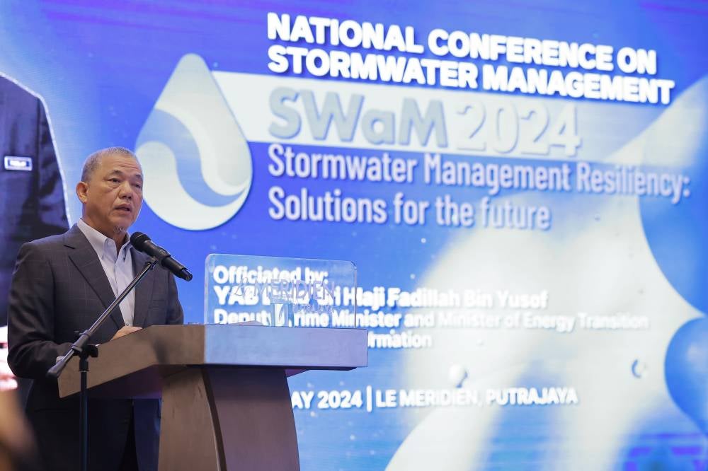 Deputy Prime Minister and Energy Transition and Water Transformation Minister Datuk Seri Fadillah Yusof delivering his speech during the "National Conference On Stormwater Management SWaM 2024" launching, today. - Photo by Bernama