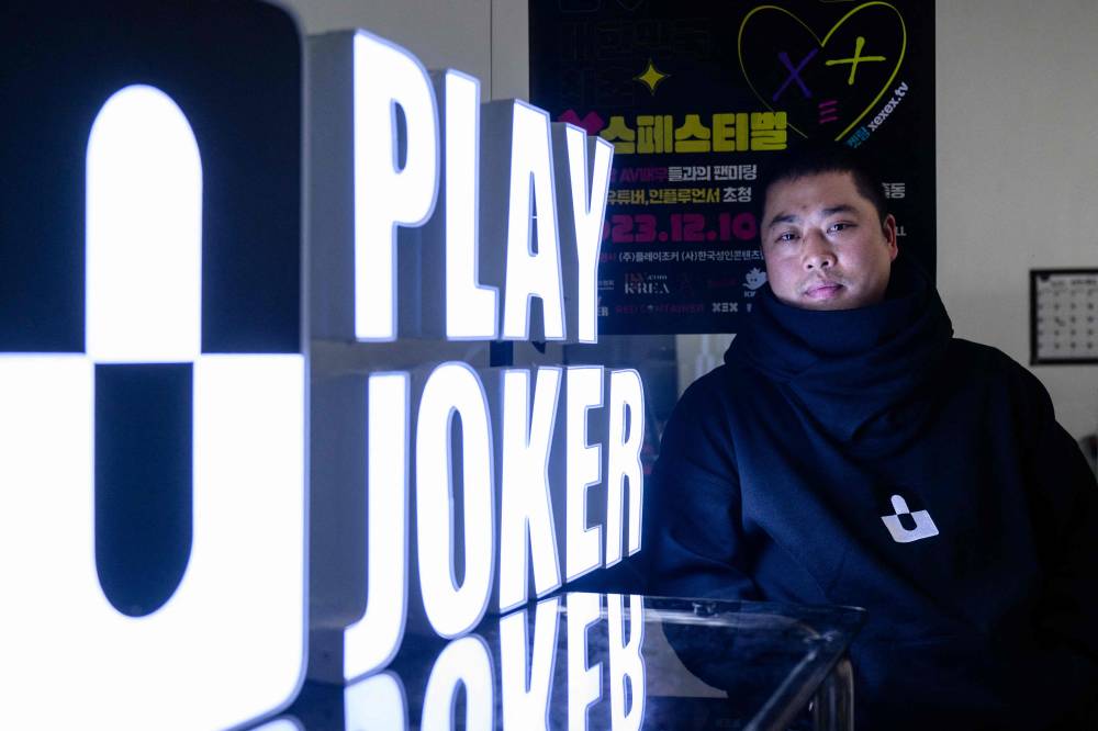 In this photo taken on May 13, 2024 entrepreneur Lee Hee-tae, who had planned South Korea's largest sex festival in April, a two-day event which was banned by authorities following a backlash by local rights groups, poses at his office during an interview with AFP in Seoul. - Photo by AFP