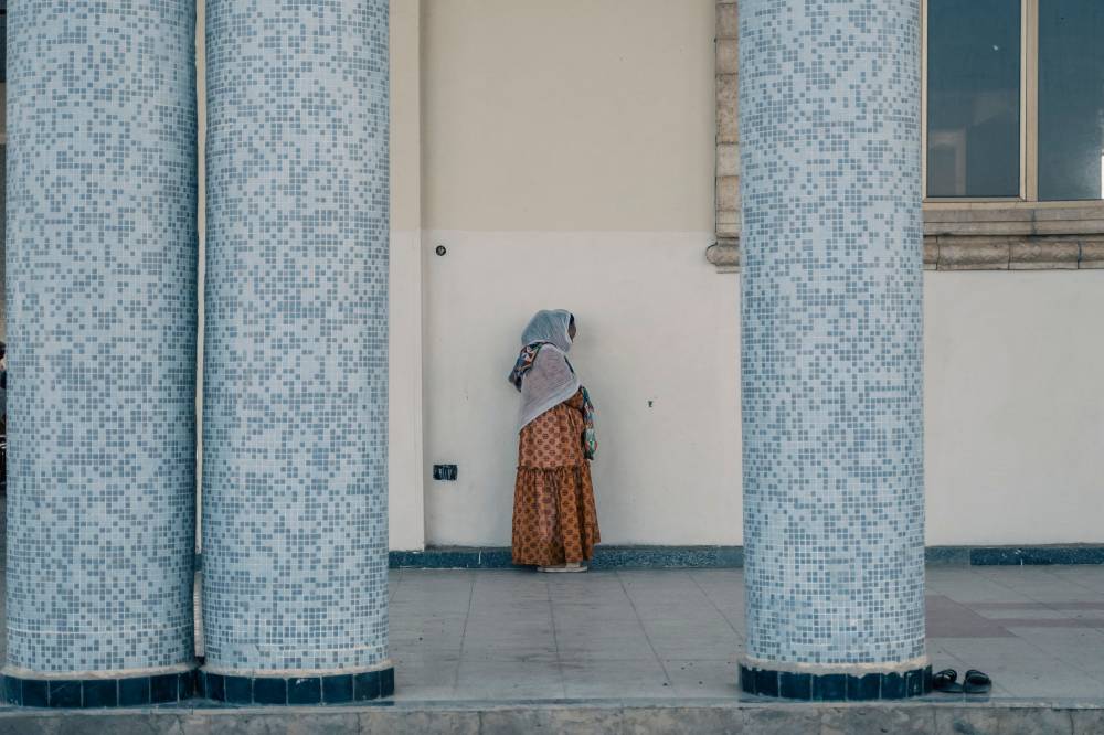 A woman attends the Sunday prayers at Saint Gabriel church in the city of Mekelle, Ethiopia, on May 26, 2024. (Photo by AFP)