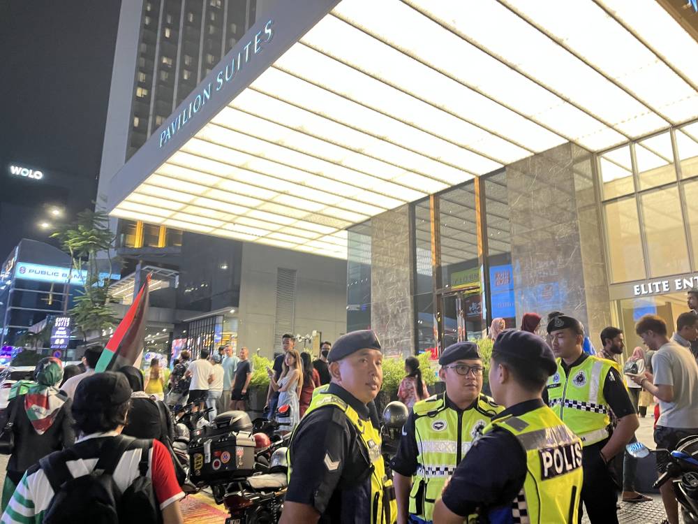 Police monitoring the rally. 