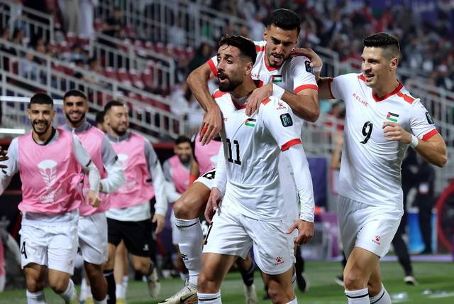 Palestine’s Oday Dabbagh celebrates after scoring a goal against Hong Kong at the Abdullah Bin Khalifa Stadium in Doha Jan 24, 2024. - Photo by Berrnama