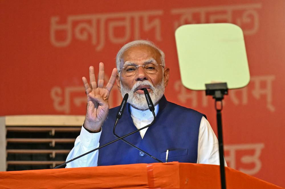 India’s Prime Minister Narendra Modi addresses his supporters after Bharatiya Janata Party (BJP) won in country's general election, in New Delhi on June 4, 2024. - (Photo by MONEY SHARMA / AFP)