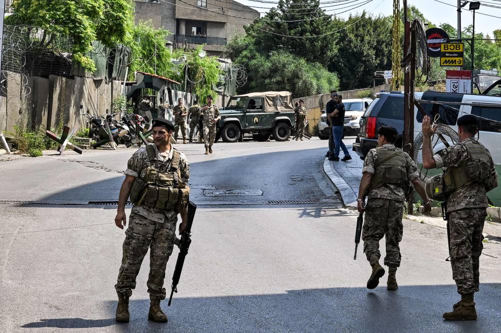 Lebanese army soldiers deploy near the US embassy in Beirut on June 5, 2024, after a Syrian man was arrested following a shooting near the embassy. (Photo by JOSEPH EID / AFP)