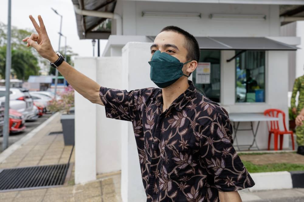A part-time worker at a car rental company Tariq Hazim Mohd Yusri, 25, was fined RM100 by the Kajang Magistrate's Court today after pleading guilty to placing Israeli flag stickers at a fast-food restaurant last month. - Photo by Bernama