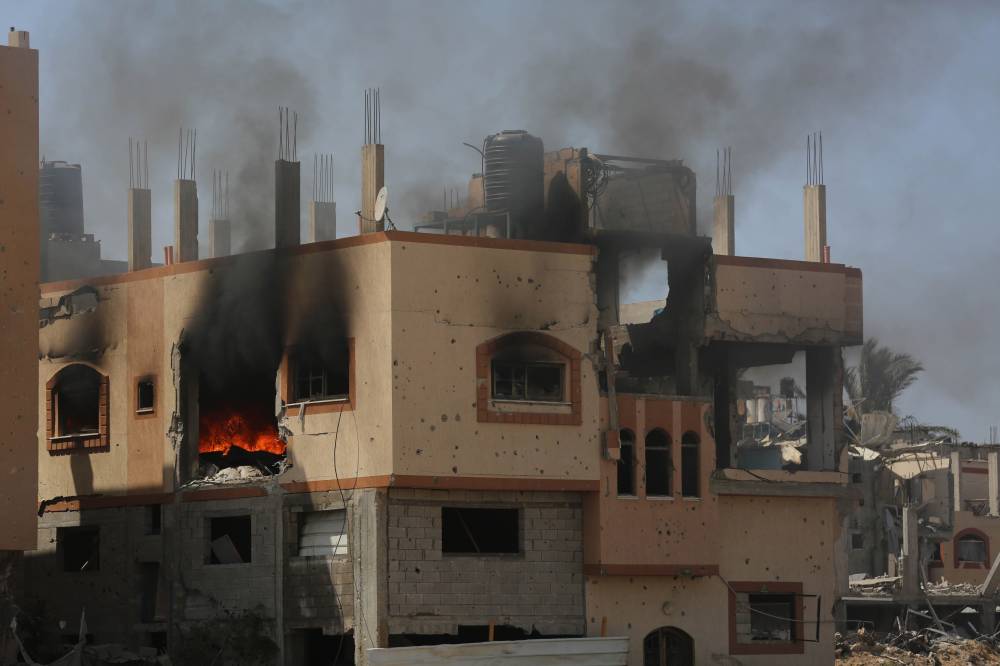 Buildings damaged during Israeli attacks in the Nuseirat refugee camp in the central Gaza Strip. Photo by Marwan Daoud /Xinhua