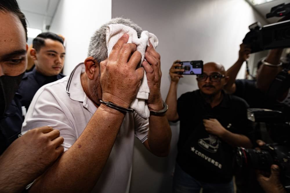 Wong Chun Foo, 56, was today charged with murdering his wife two days ago. - Photo by Bernama