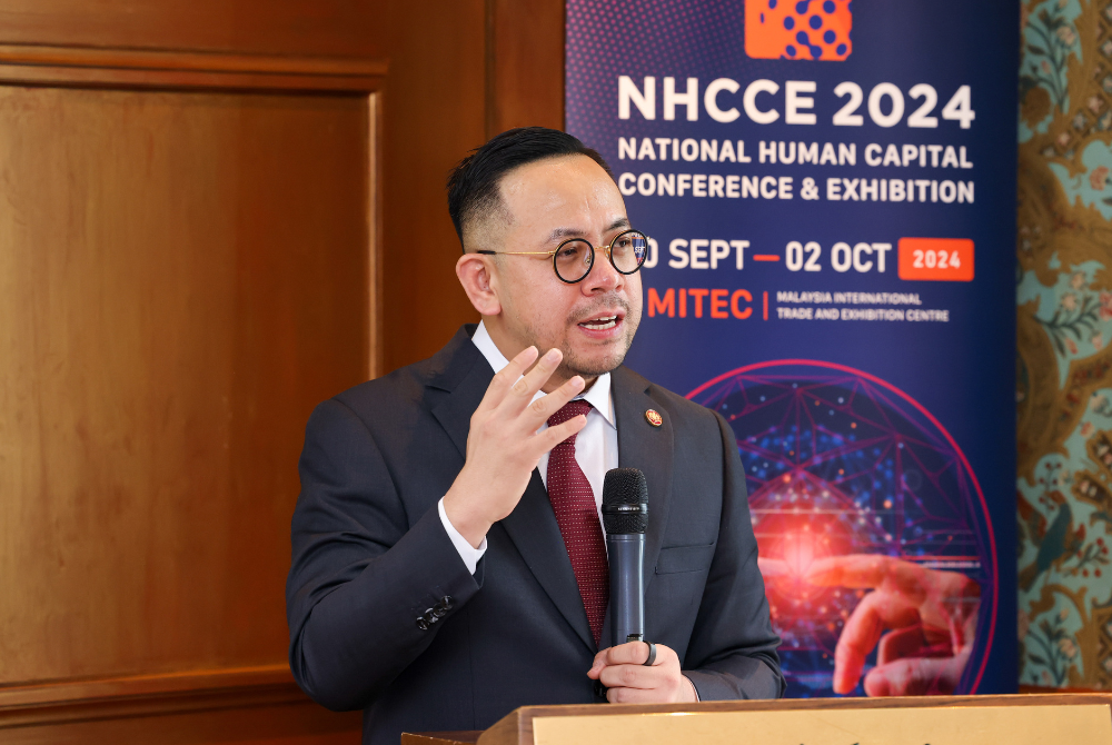 Human Resource Minister Steven Sim 