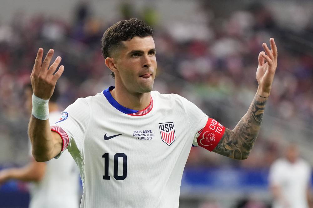 Christian Pulisic of United States celebrates after scoring the team's first goal during the CONMEBOL Copa America 2024 Group C match between United States and Bolivia at AT&T Stadium on June 23, 2024 in Arlington, Texas. - Photo by AFP