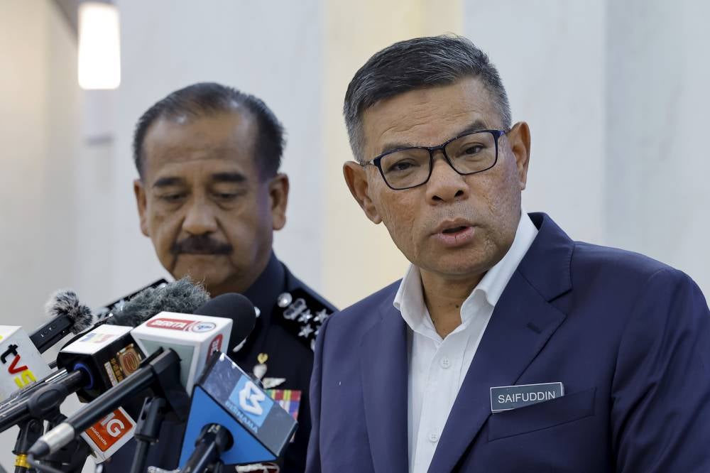 Saifuddin during a press conference here today. Photo by Bernama