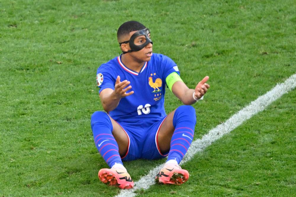 France's forward #10 Kylian Mbappe reacts during to the UEFA Euro 2024 Group D football match between France and Poland at the BVB Stadion in Dortmund on June 25, 2024. (Photo by AFP)